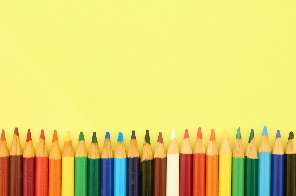 Free Image of A row of colored pencils 