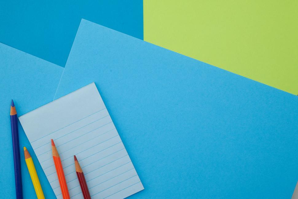 Free Image of A group of colored pencils on a piece of paper 