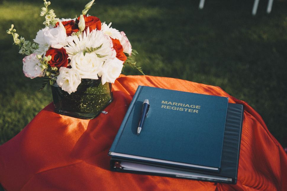 Free Image of A book and a pen on a table 