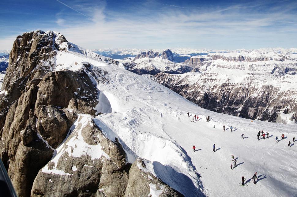 Free Image of A group of people on a snowy mountain 