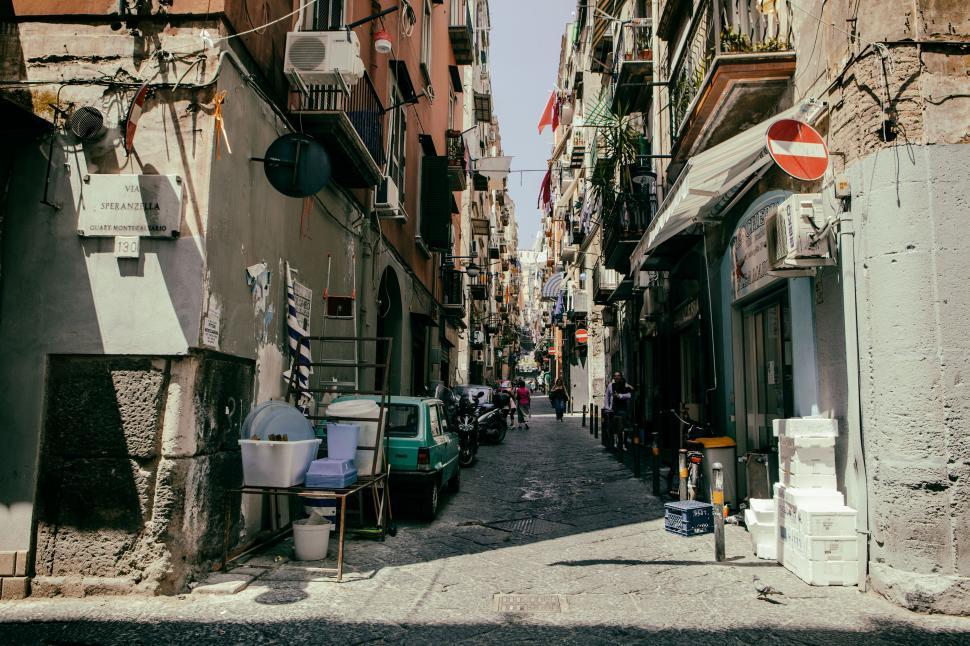 Free Image of A street with buildings and cars 
