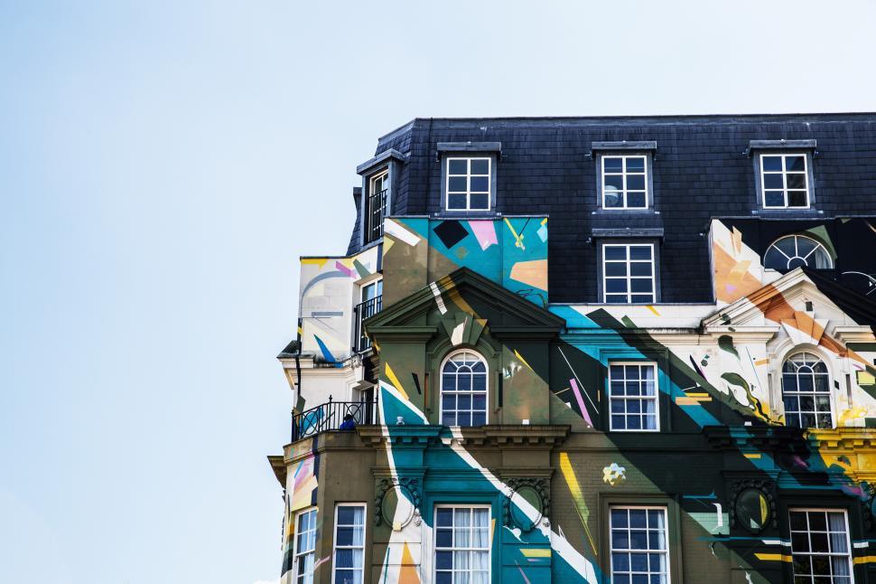 Free Image of A multicolored building with a blue sky 