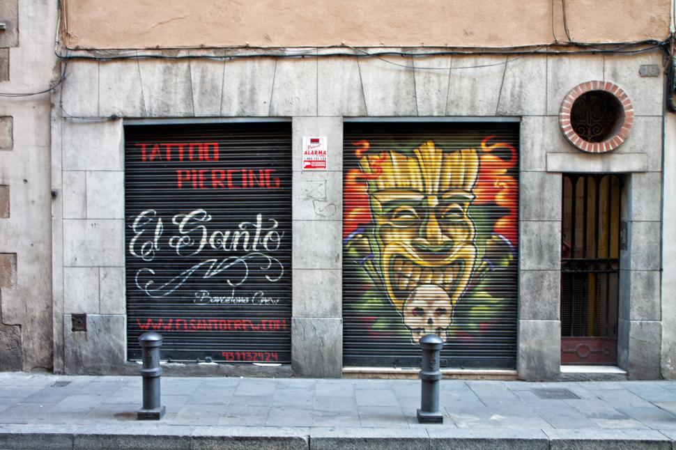 Free Image of A two garage doors with graffiti on them 