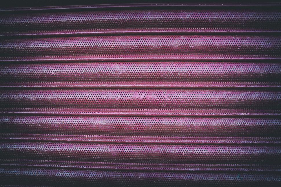 Free Image of A close up of a pink surface 
