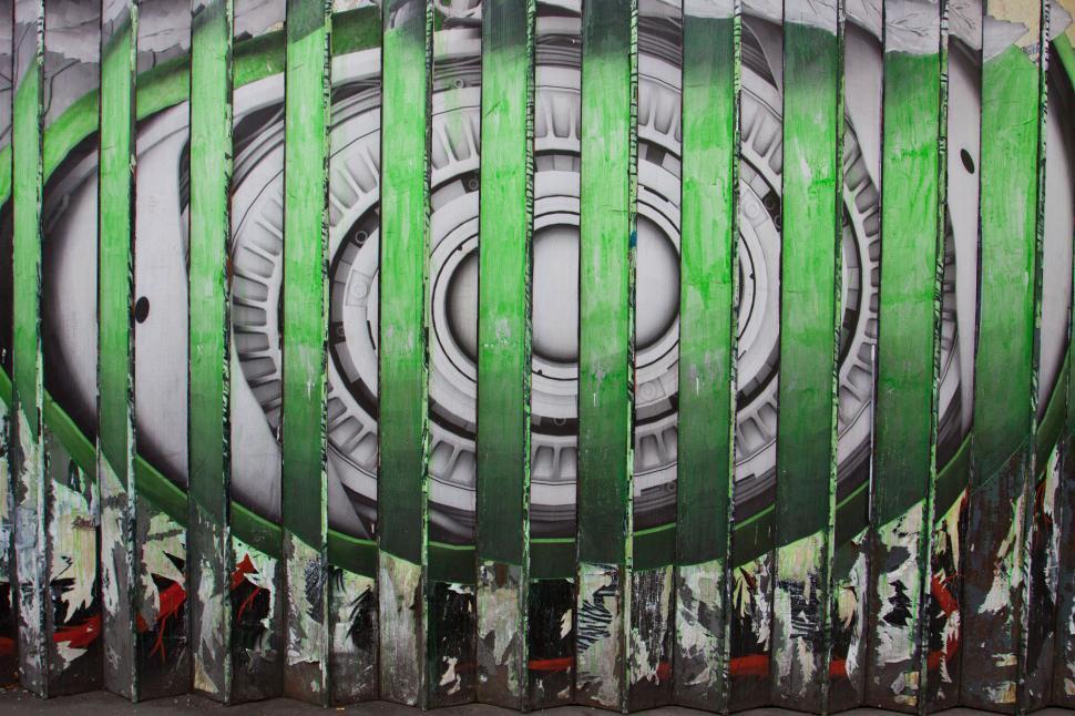 Free Image of A painted accordion panel with a circular design 