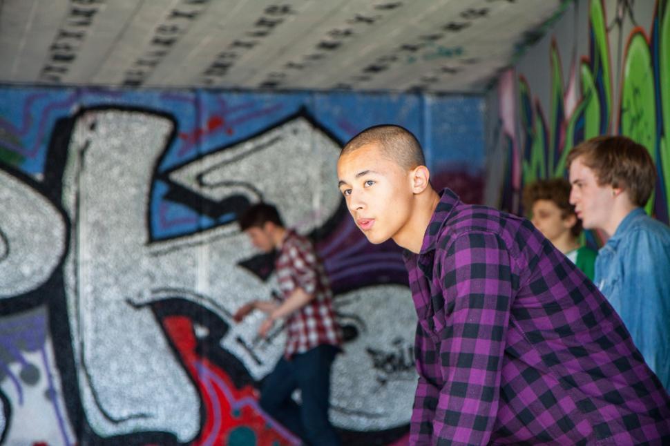 Free Image of A man in purple shirt 