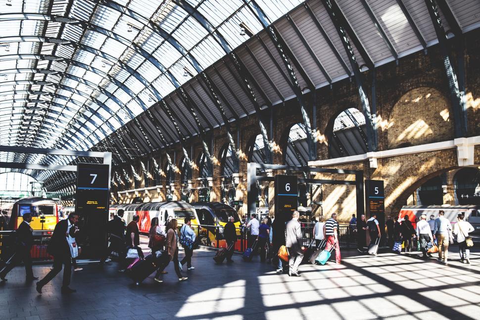 Free Image of A group of people in a train station 