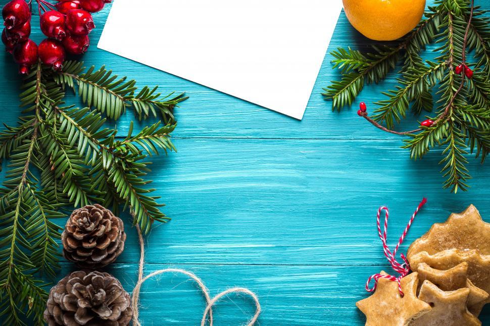 Free Image of A blue wood table with pine cones and pinecones 