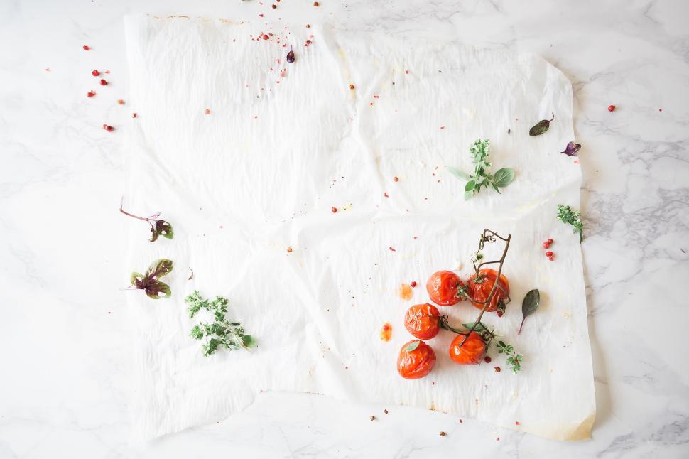 Free Image of Tomatoes on a white surface 