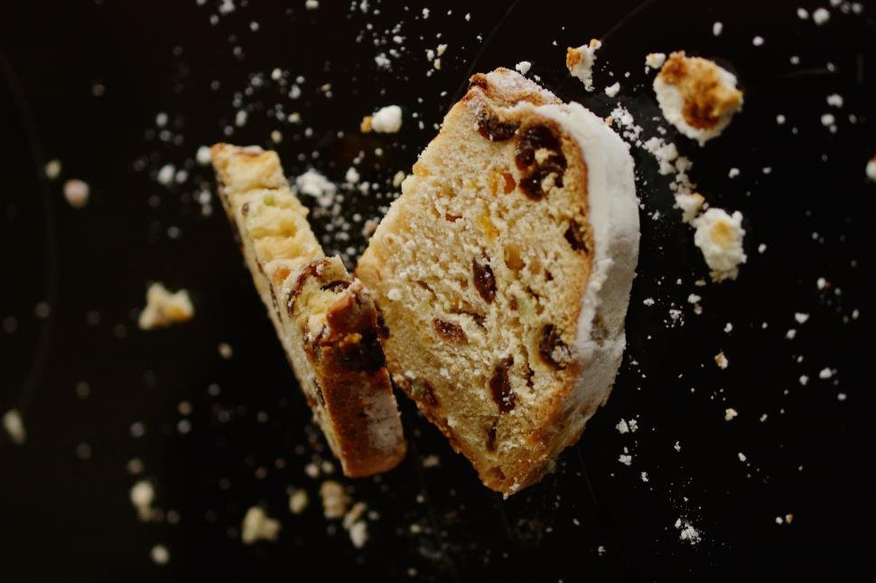 Free Image of A piece of sweet bread on a black surface 