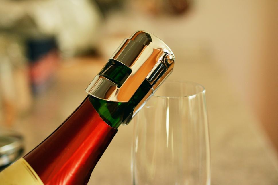 Free Image of Champagne Being Poured Into a Glass 