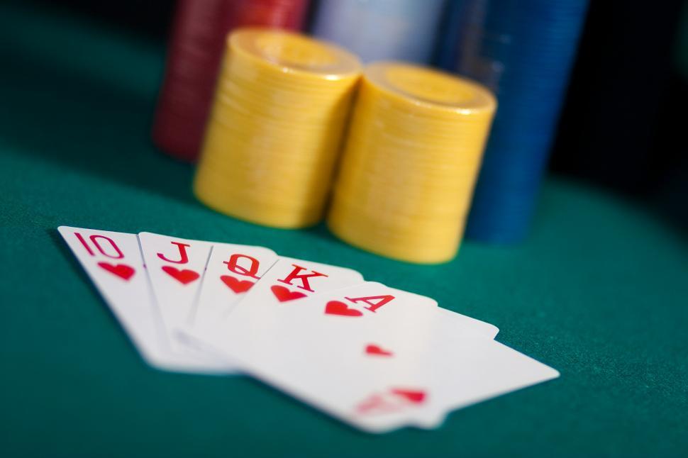 Free Image of Four Cards of a Kind Resting on a Table 