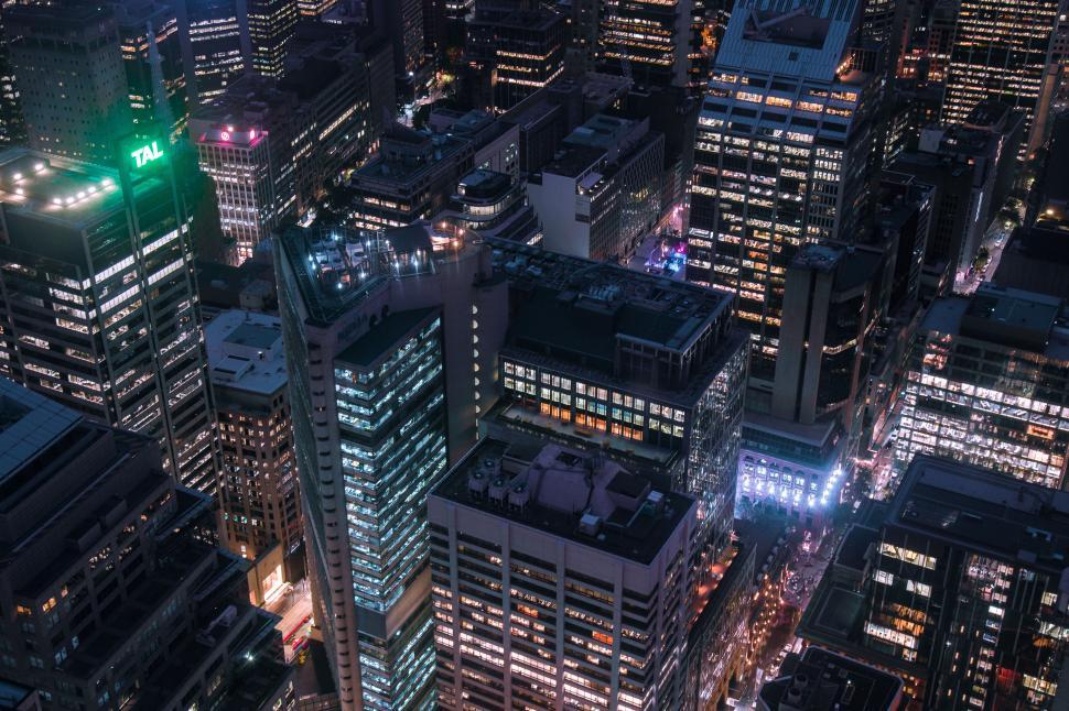 Free Image of A city at night with many tall buildings 