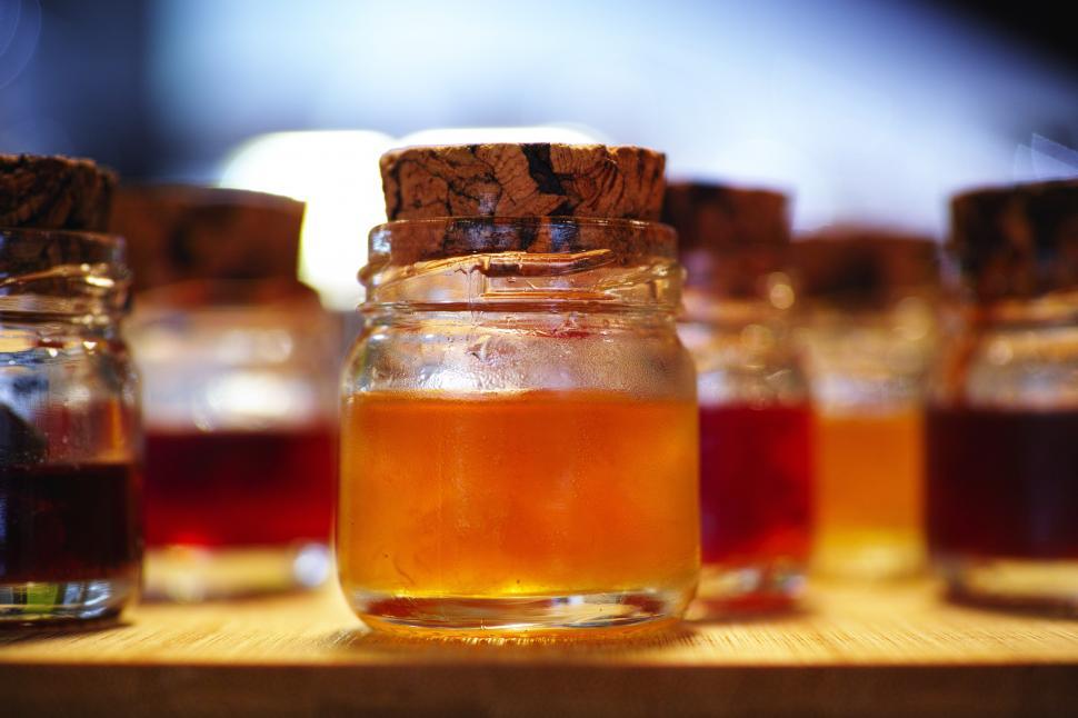 Free Image of A group of jars with liquid 