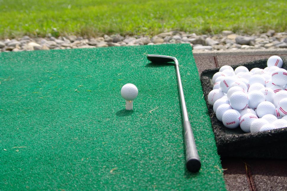 Free Image of Miniature Golf Course With Balls and Golf Club 