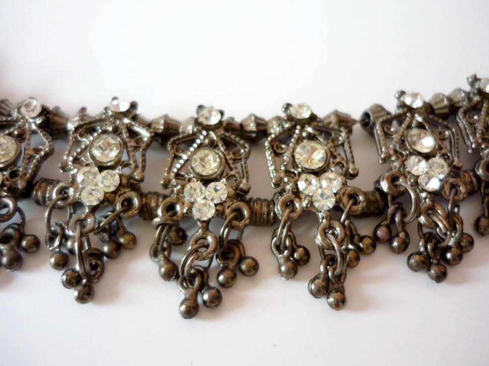 Free Image of Close Up of Necklace on White Surface 