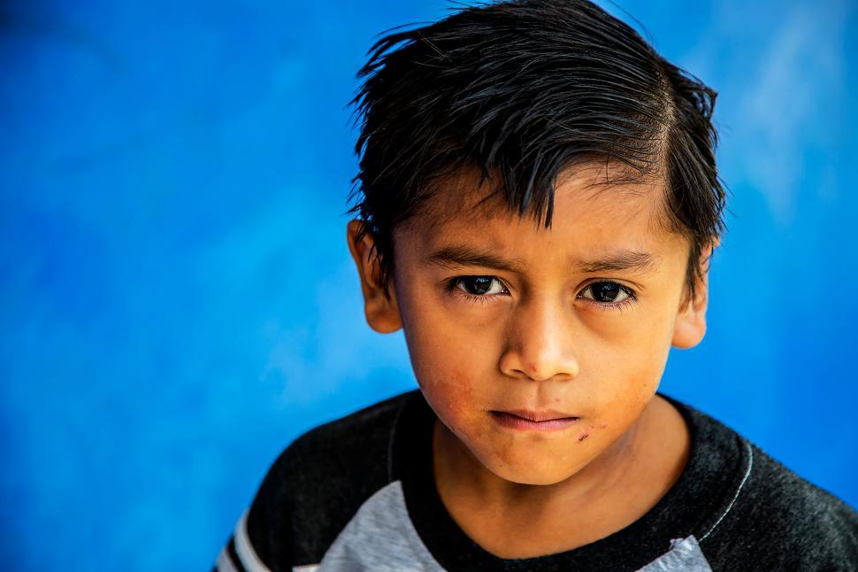 Free Image of A boy looking at the camera 