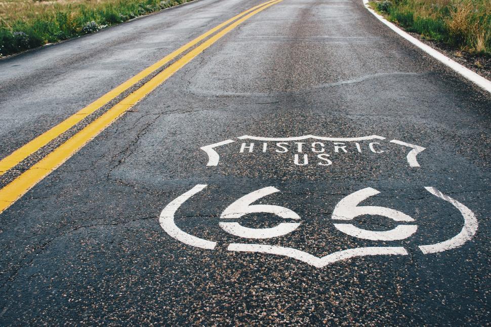 Free Image of A road with a sign on it 