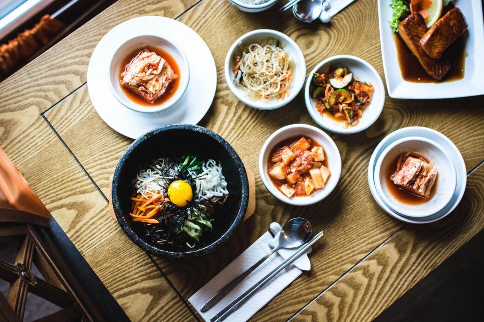 Free Image of A table with bowls of food 