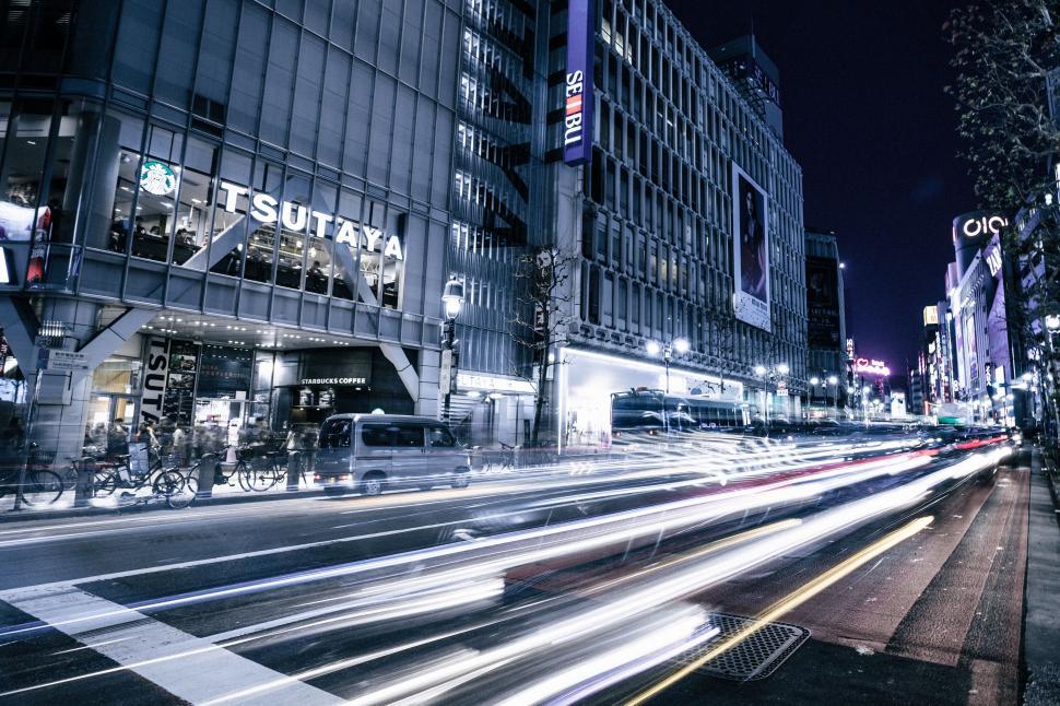 Free Image of A street with cars and buildings 