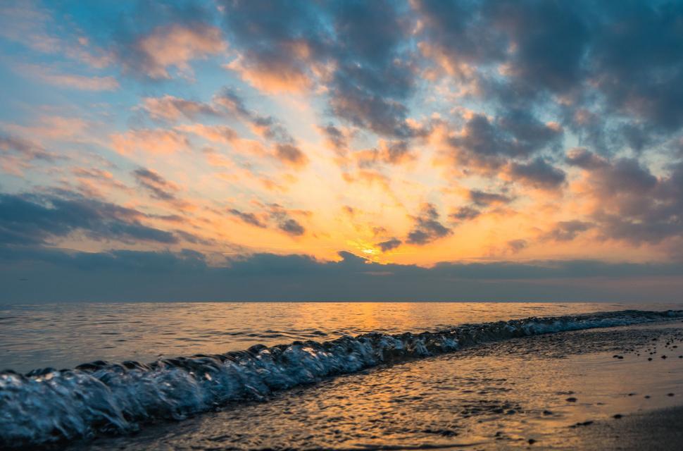 Free Image of A waves on a beach 