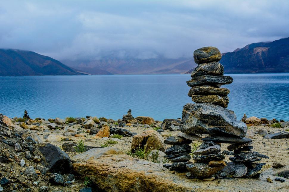Free Image of A stack of rocks on a beach 