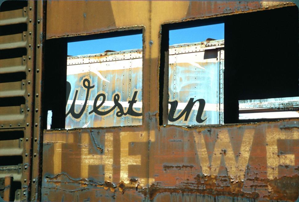 Free Image of Train seen through another train 