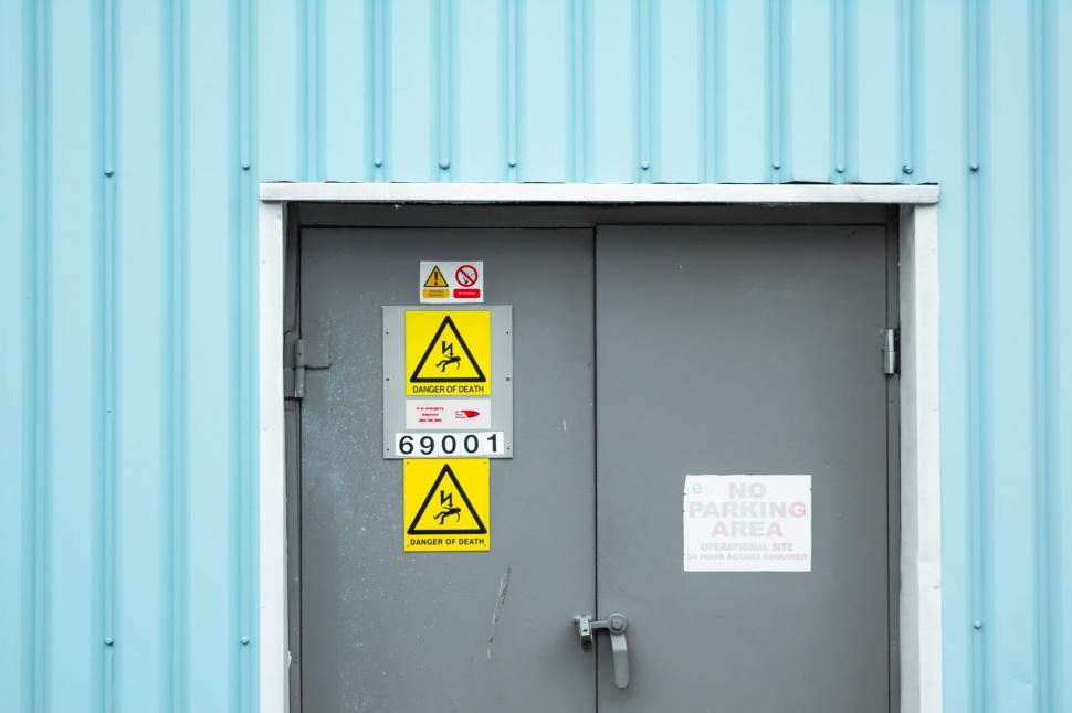Free Image of A door with signs on it 