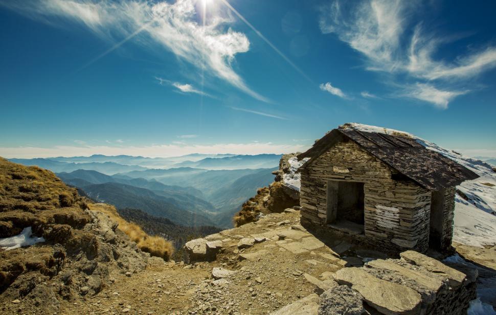 Free Image of A stone building on a rocky hill 
