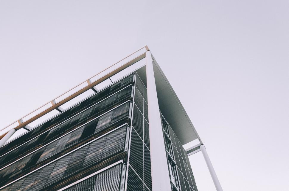 Free Image of A building with a white railing 