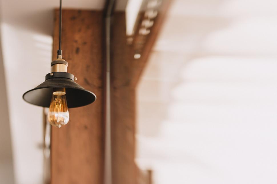Free Image of A light bulb from a ceiling 