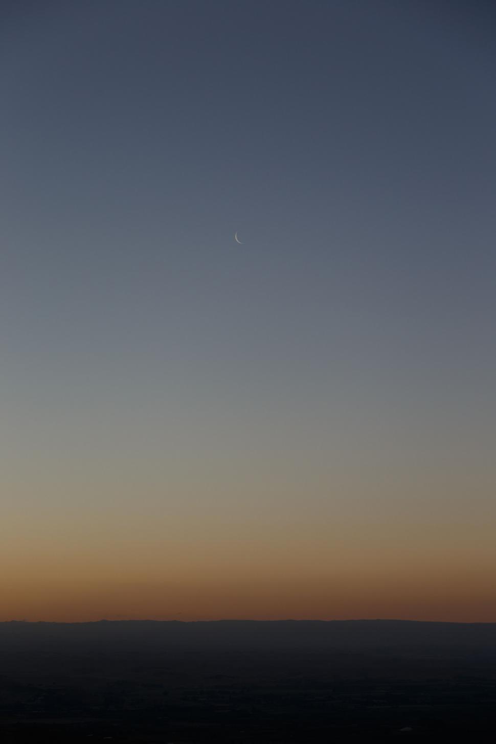 Free Image of A sunset over a city 