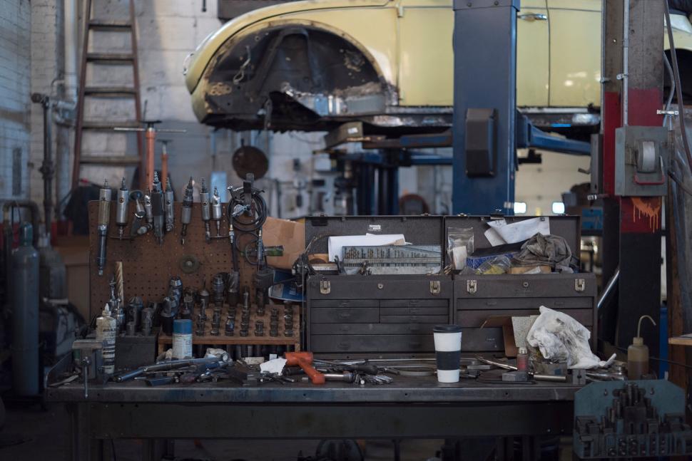 Free Image of A workbench with tools on it 