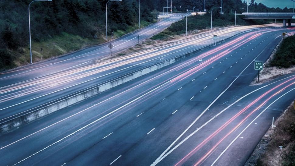 Free Image of A road with lights on it 