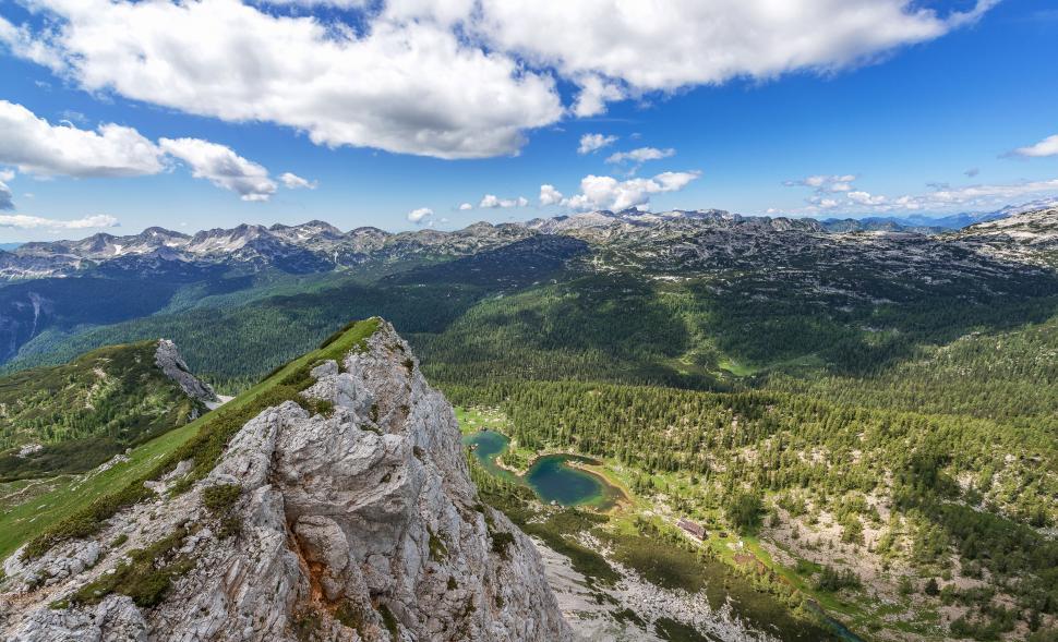 Free Image of A mountain with a lake and trees 