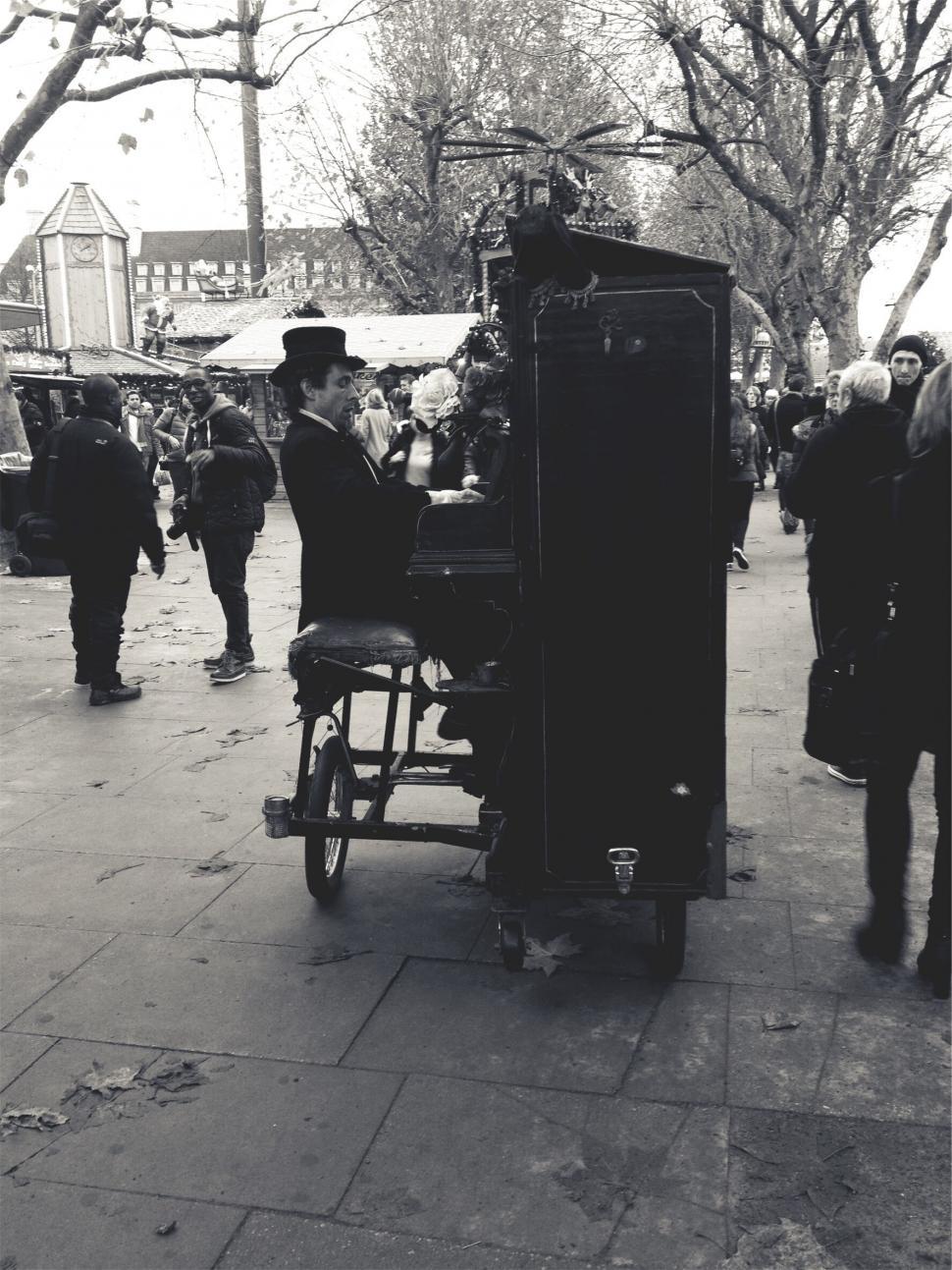 Free Image of A man playing a piano 