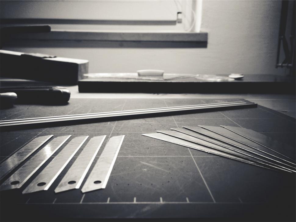 Free Image of A group of metal pieces on a table 