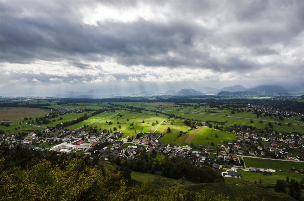 Free Image of A landscape with a city and a valley 