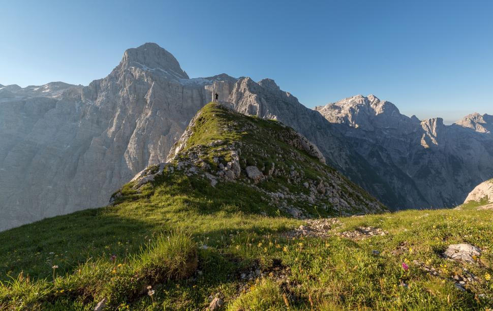 Free Image of A person standing on a mountain 