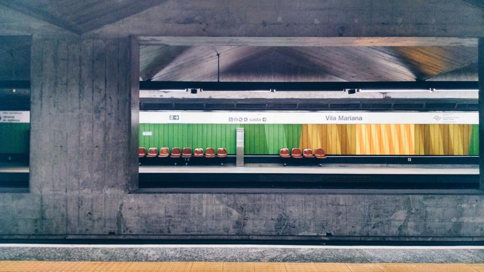 Free Image of A train station with chairs 