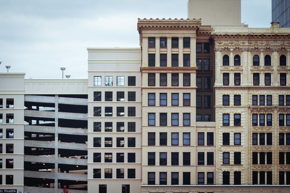 Free Image of A group of buildings with parking garages 