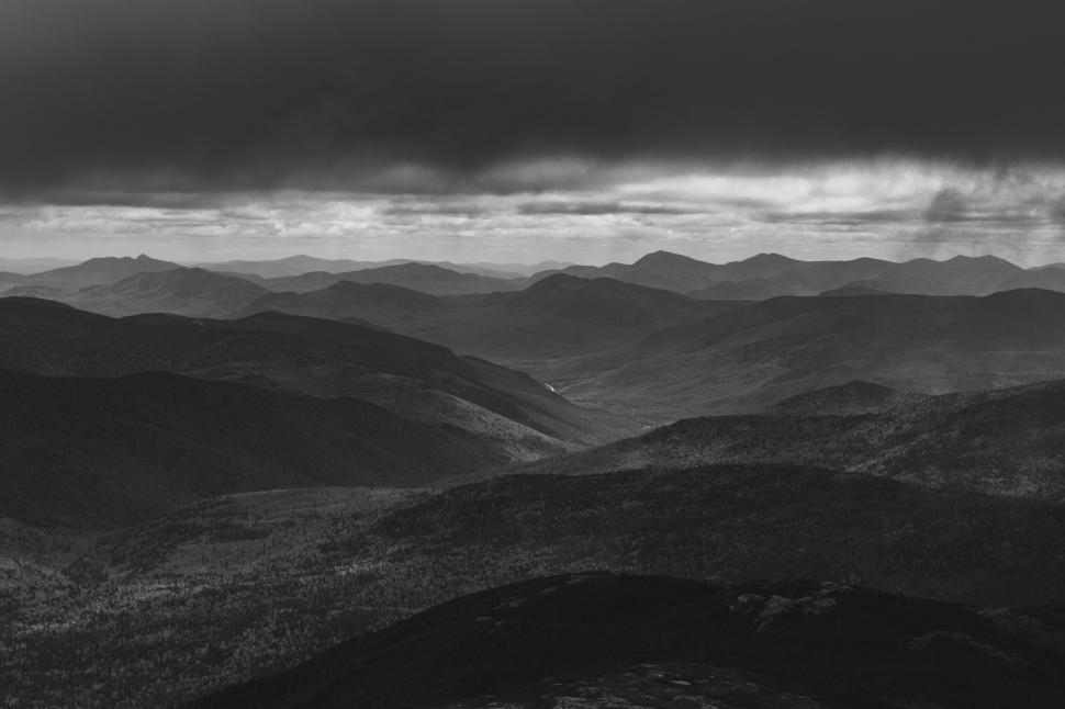 Free Image of A landscape of mountains and clouds 