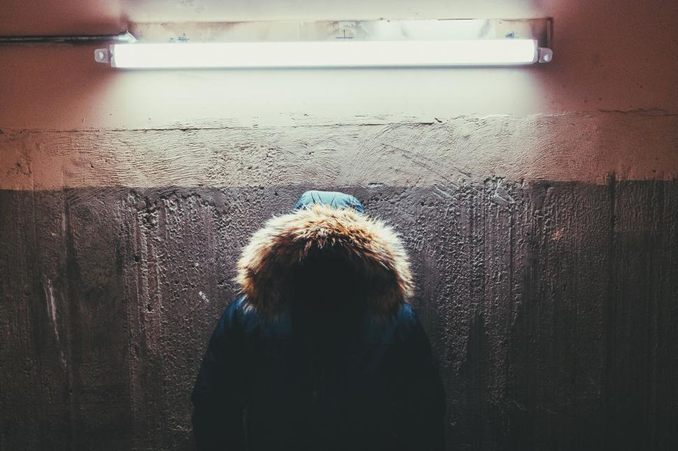 Free Image of A person in a coat with a hood 