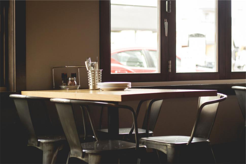 Free Image of A table with plates and utensils on it 