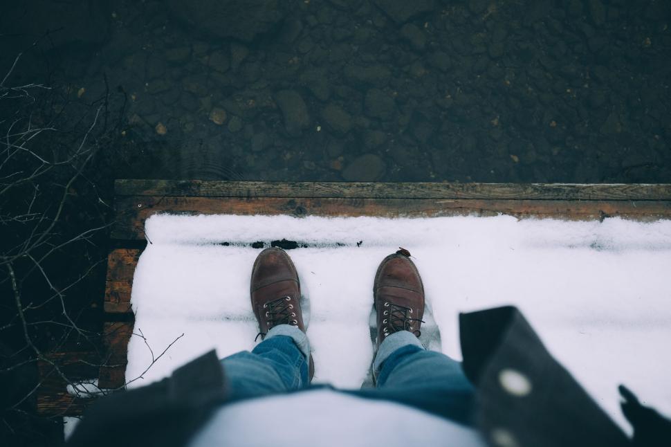 Free Image of A person standing on snow 