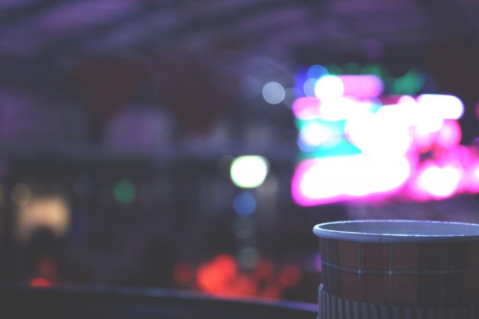 Free Image of A cup with smoke in the background 