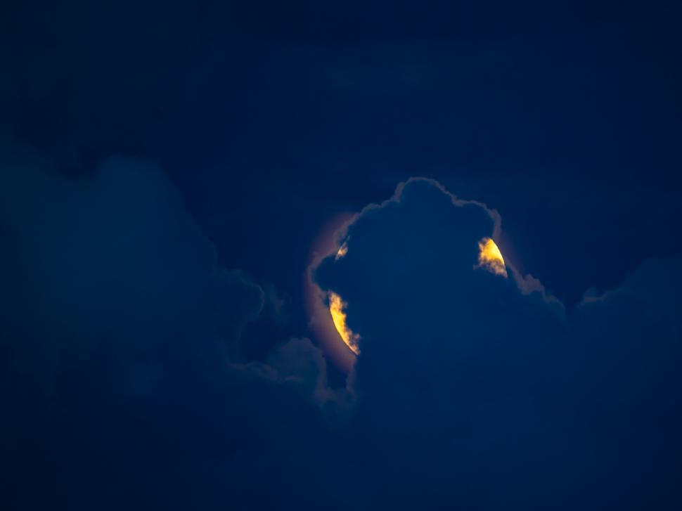 Free Image of A moon in the clouds 