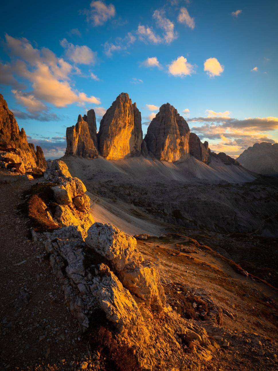 Free Image of A rocky mountains with a blue sky 
