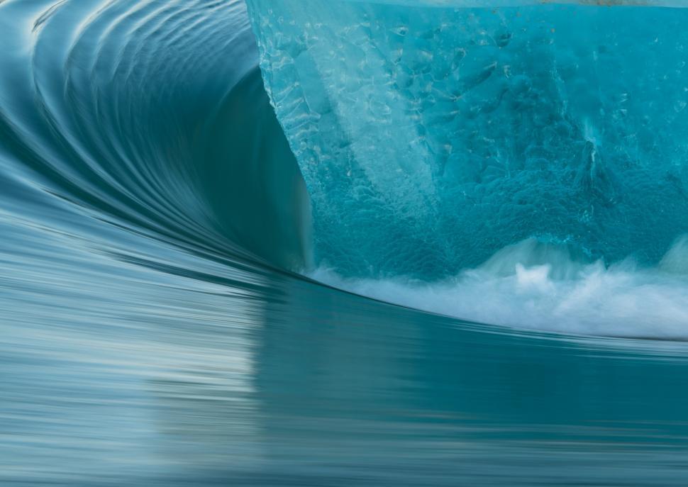 Free Image of A blue iceberg in the water 
