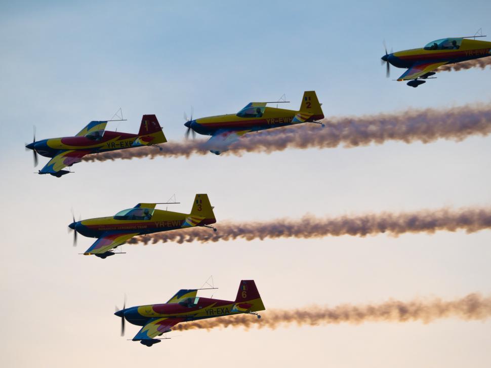 Free Image of A group of airplanes flying in the sky 